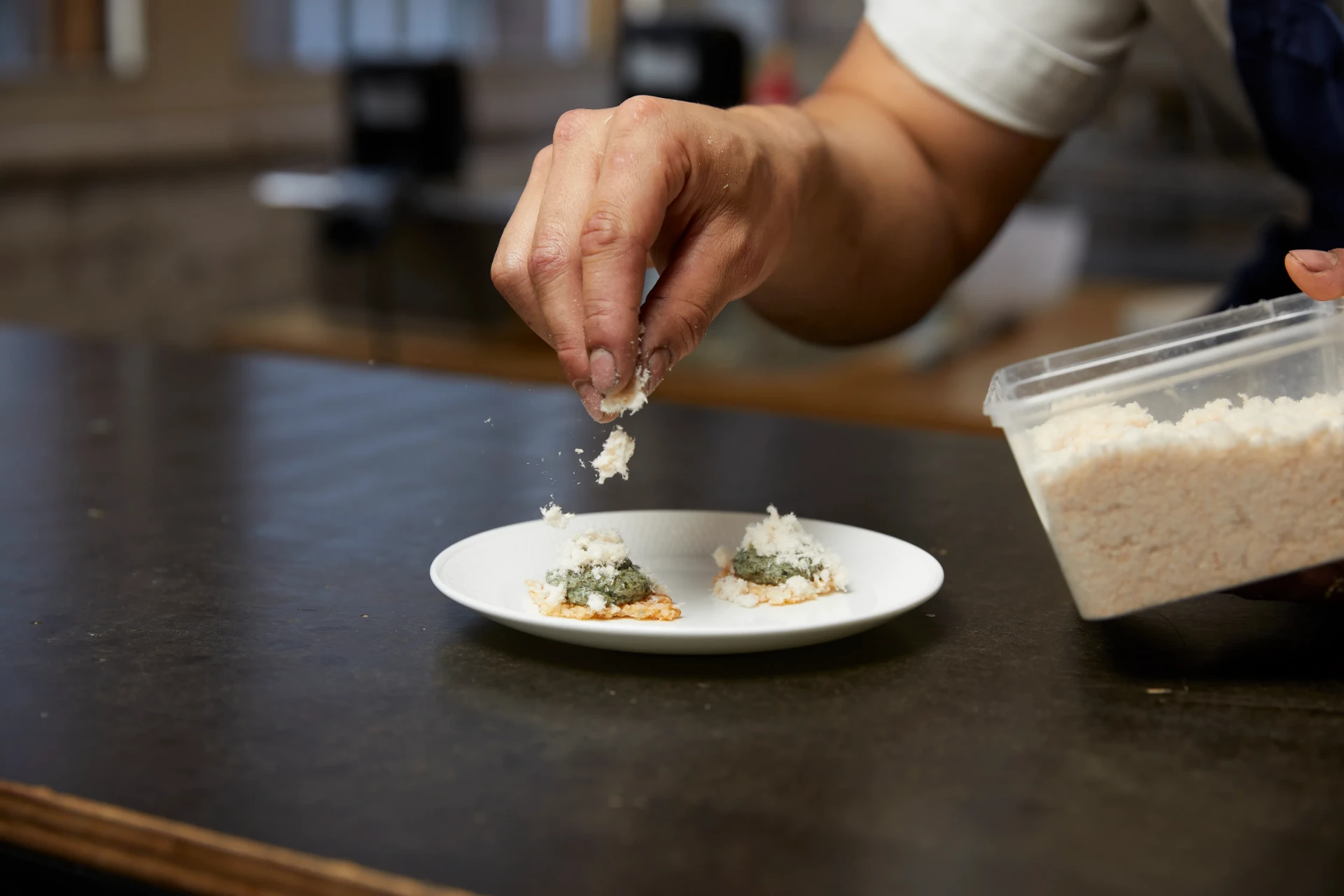 Finishing canapés at the pass — Kreative Catering, Sydney event catering