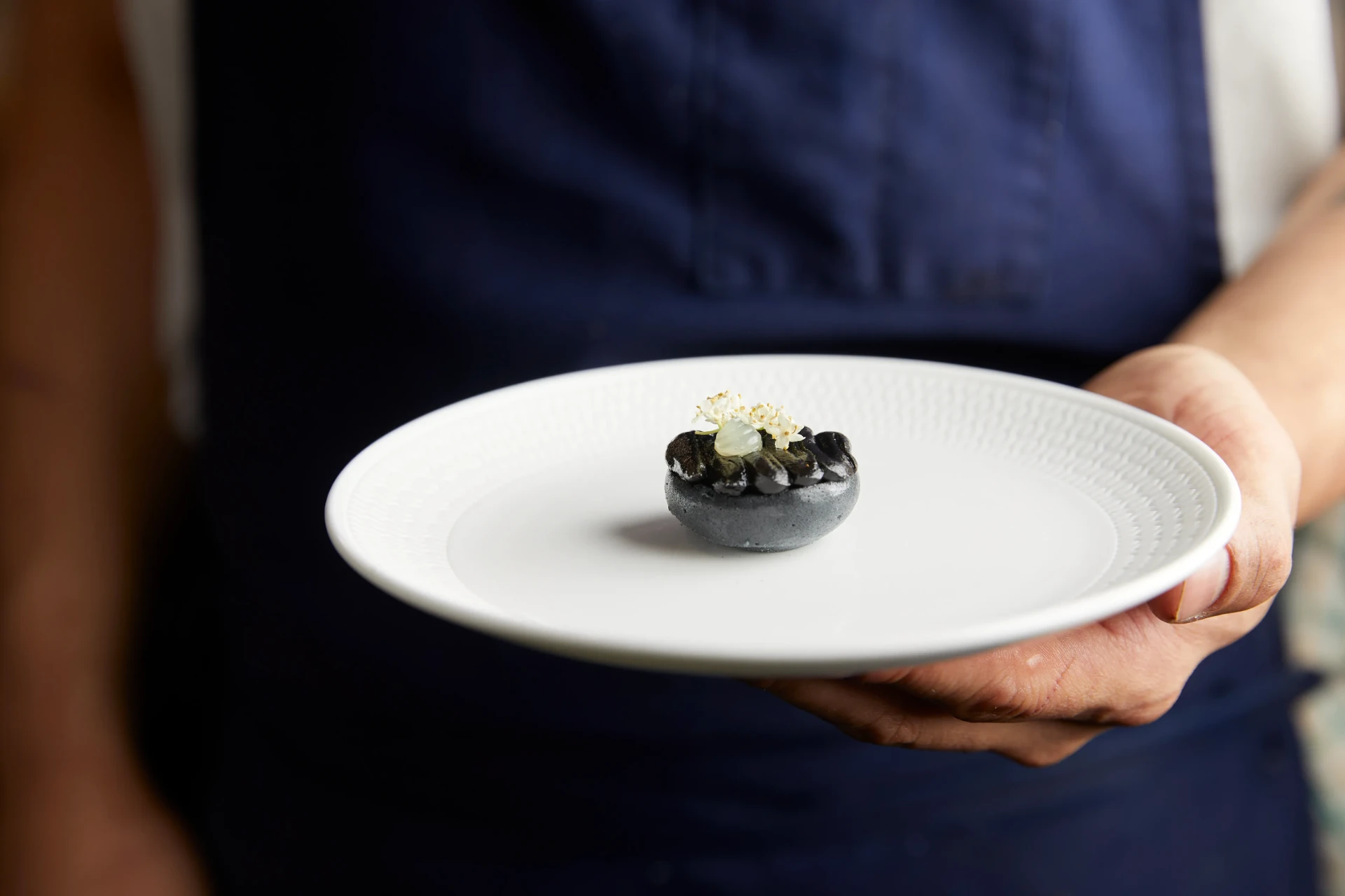 Squid ink shell, plated to order — Kreative Catering, Sydney event catering